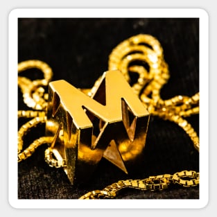 Golden M Sticker